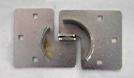 Hasp for puck lock
